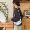 Leonie 牛角小包/肩背包